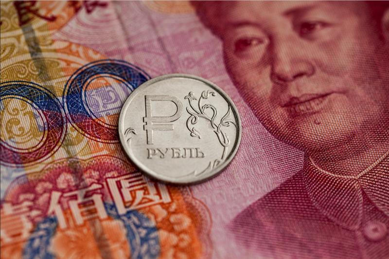 Доля юаня в расчетах России с миром достигла… 