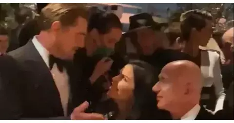 Невеста бизнесмена Безоса Лорен поцеловала Ди Каприо на публике